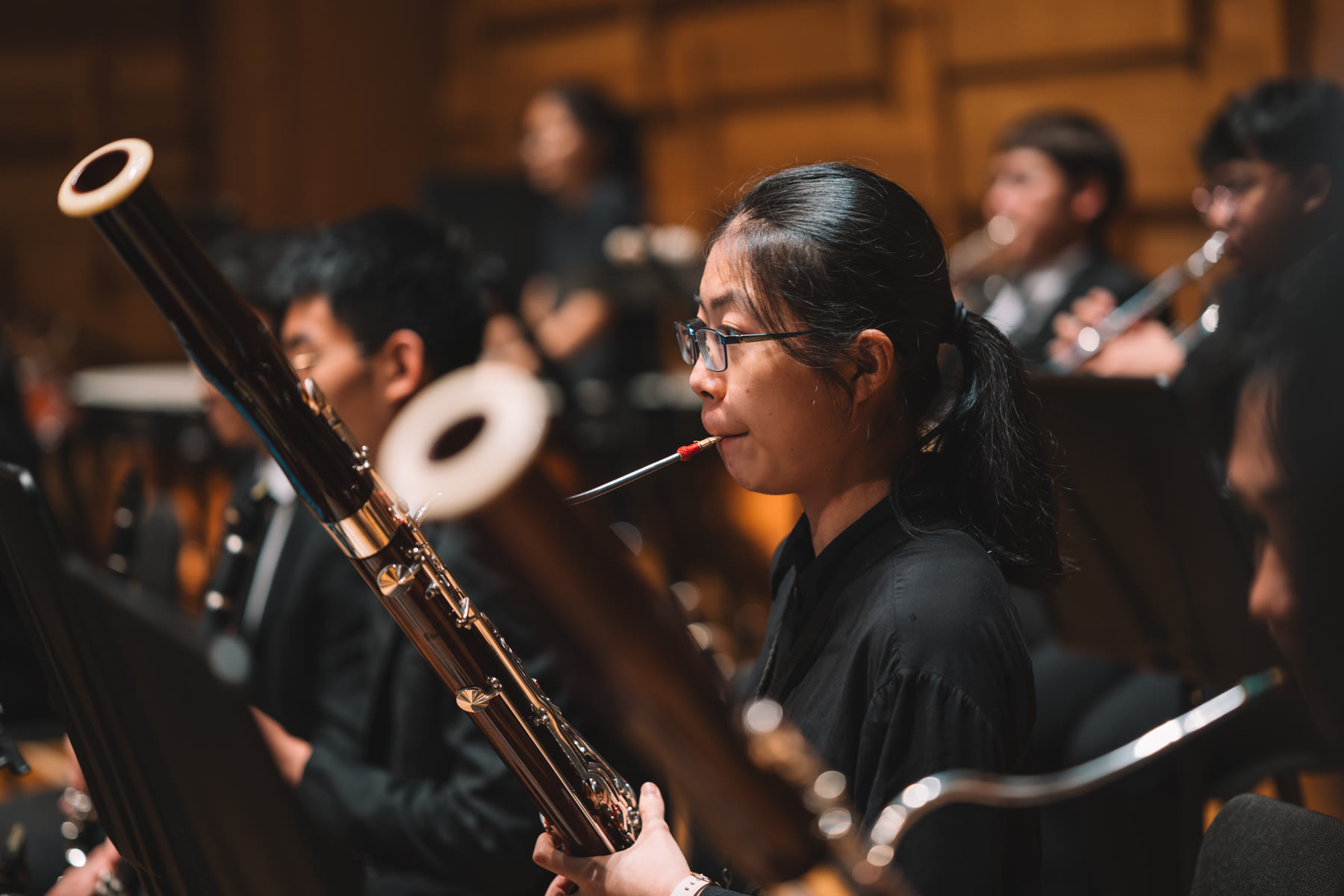 NTUSO bassoonist performing with the orchestra