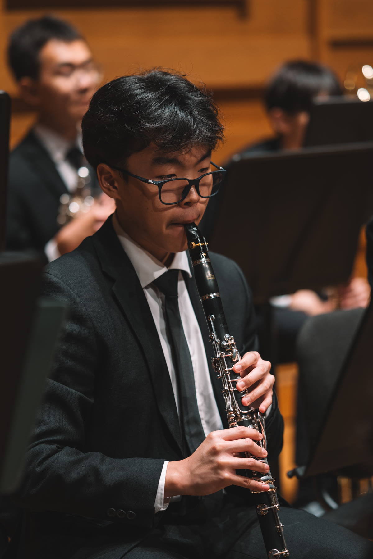 NTUSO clarinettist performing with the orchestra