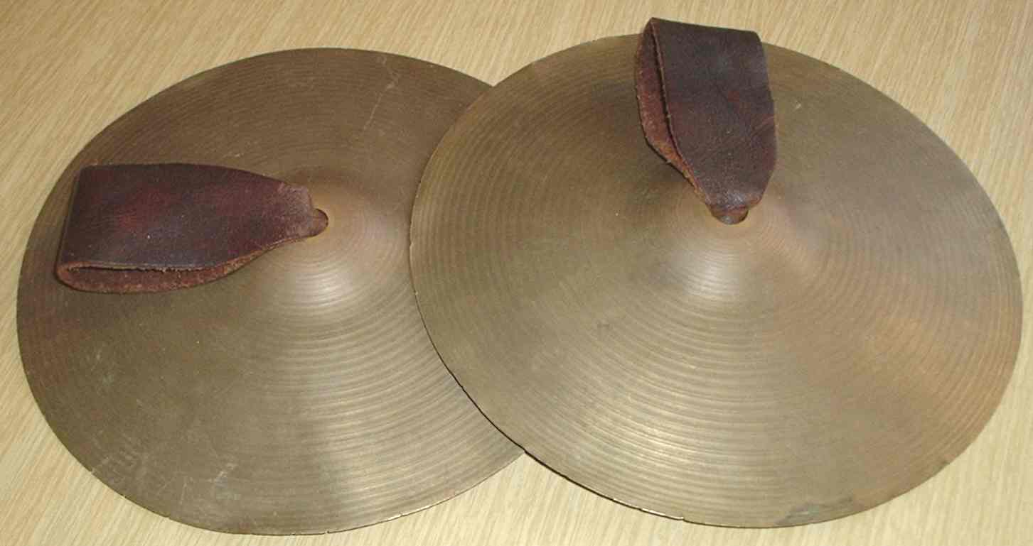 A pair of handheld orchestral clash cymbals