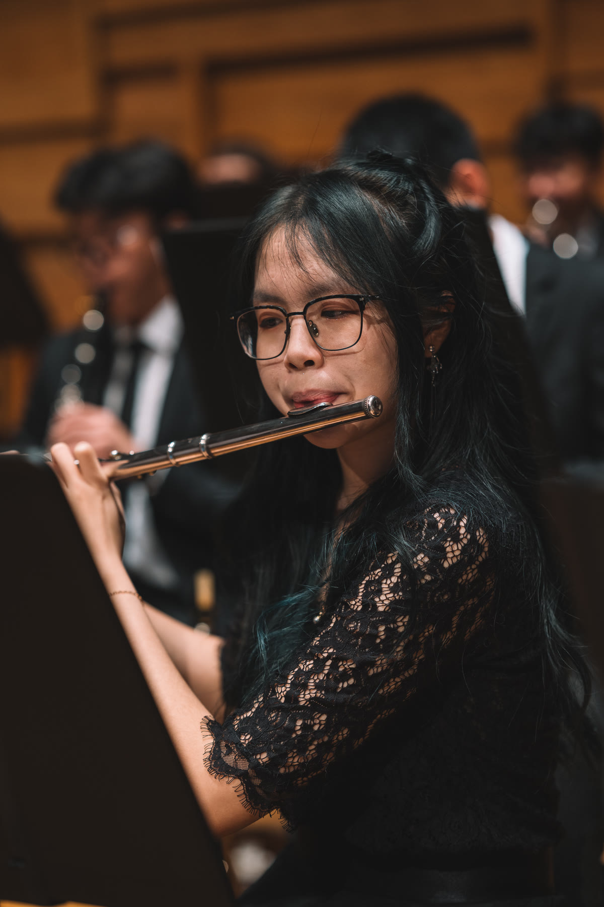 NTUSO flautist performing on stage