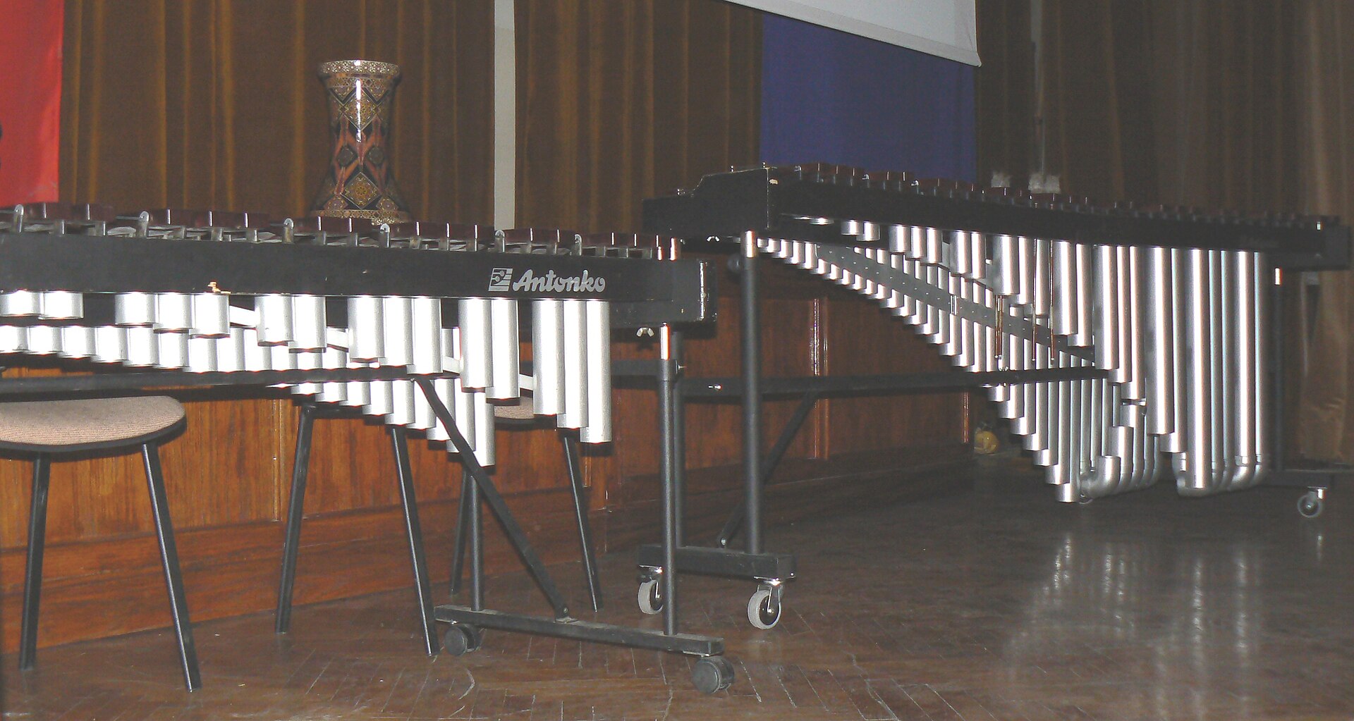 A xylophone and marimba arranged in a rehearsal room