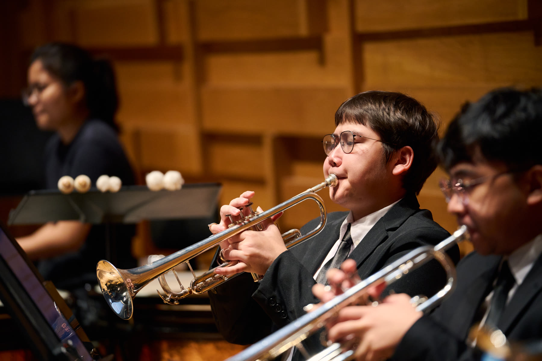 NTUSO trumpet player performing on stage