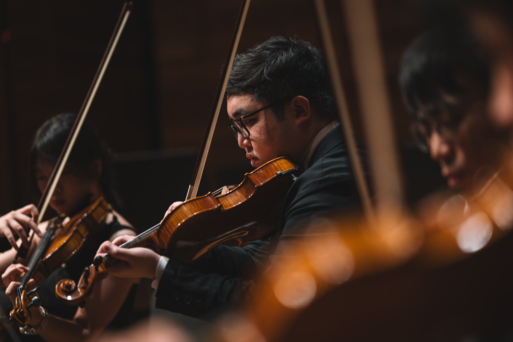 NTUSO violist performing on stage